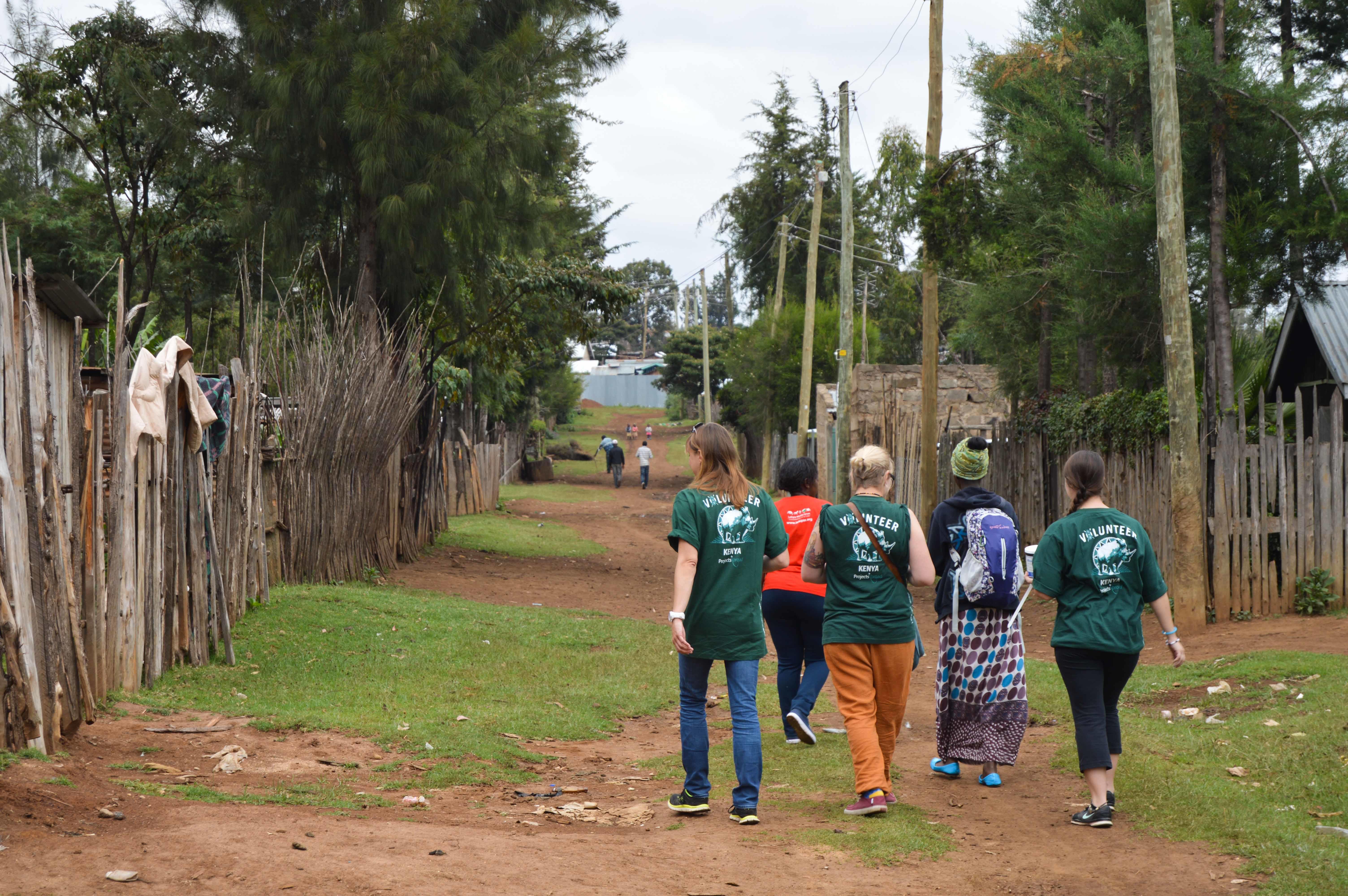 A group of high school students conducting home visits during our medical internship in Kenya A high school student speaks to a patient on Projects Abroad's medical internship in Kenya